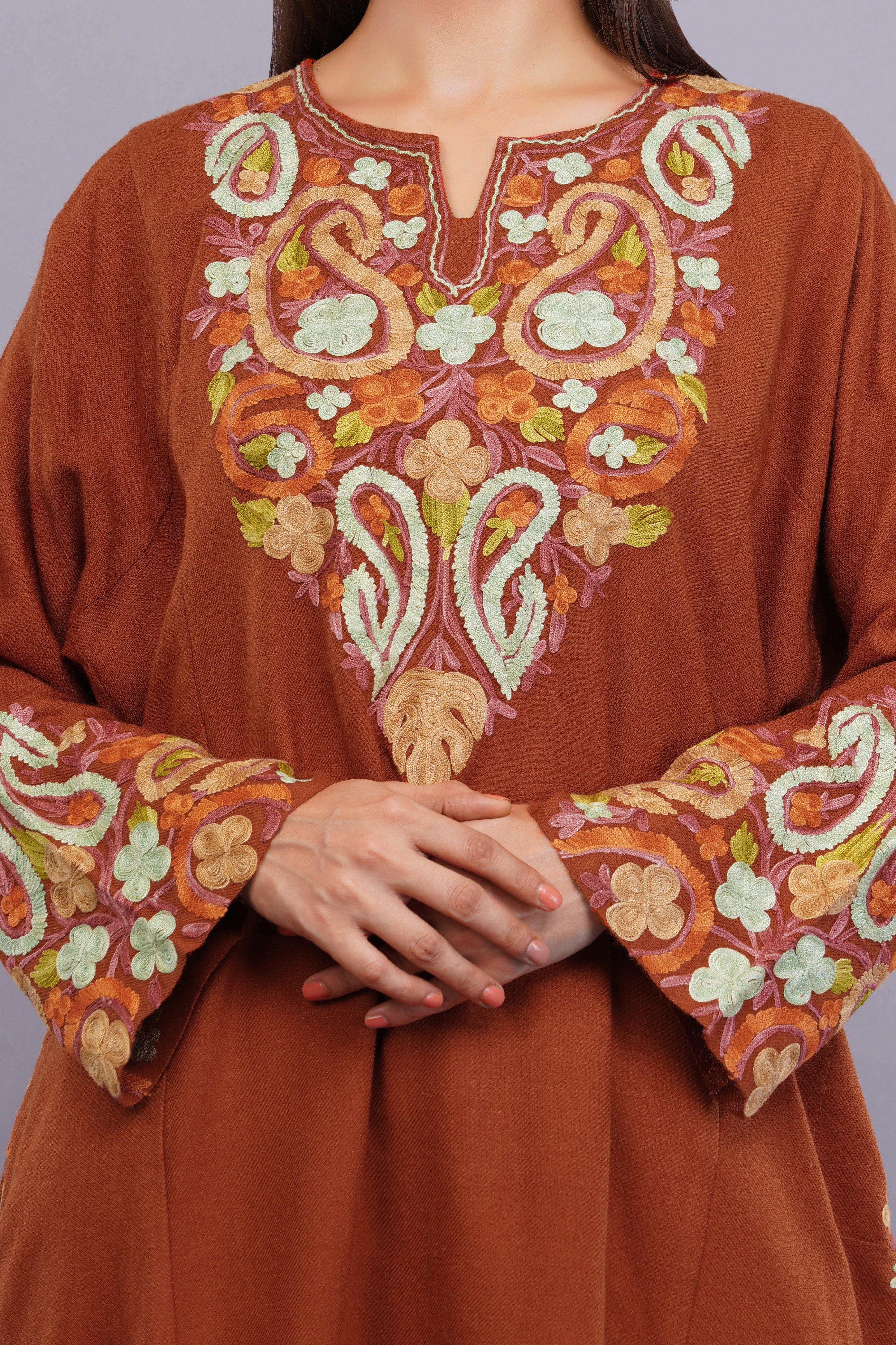Elegant Rust Kashmiri Pheran with Exquisite Aari Embroidery and Paisley Details