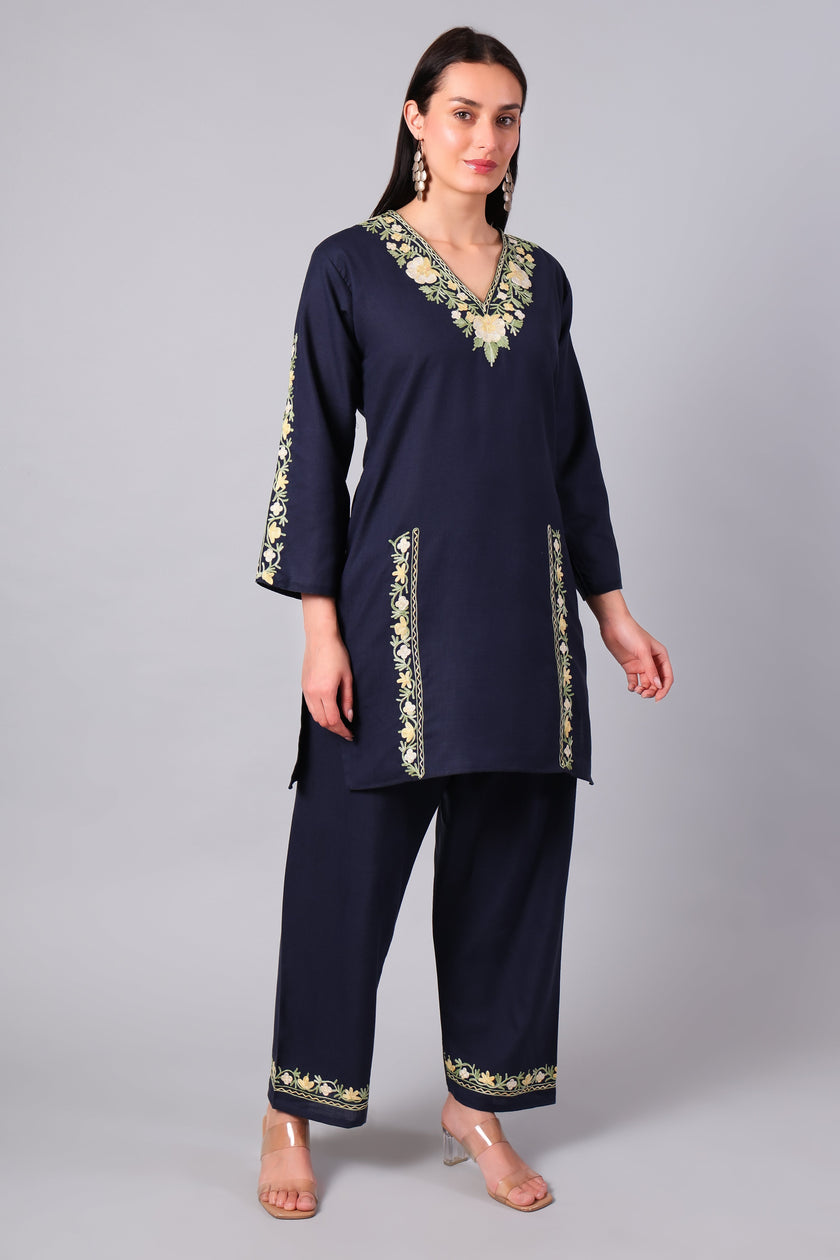 Woman wearing a navy blue traditional Cotton Summer Cord set with Aari embroidery-Right