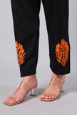 Detailed view of burnt orange Aari embroidery on black co-ord set pants