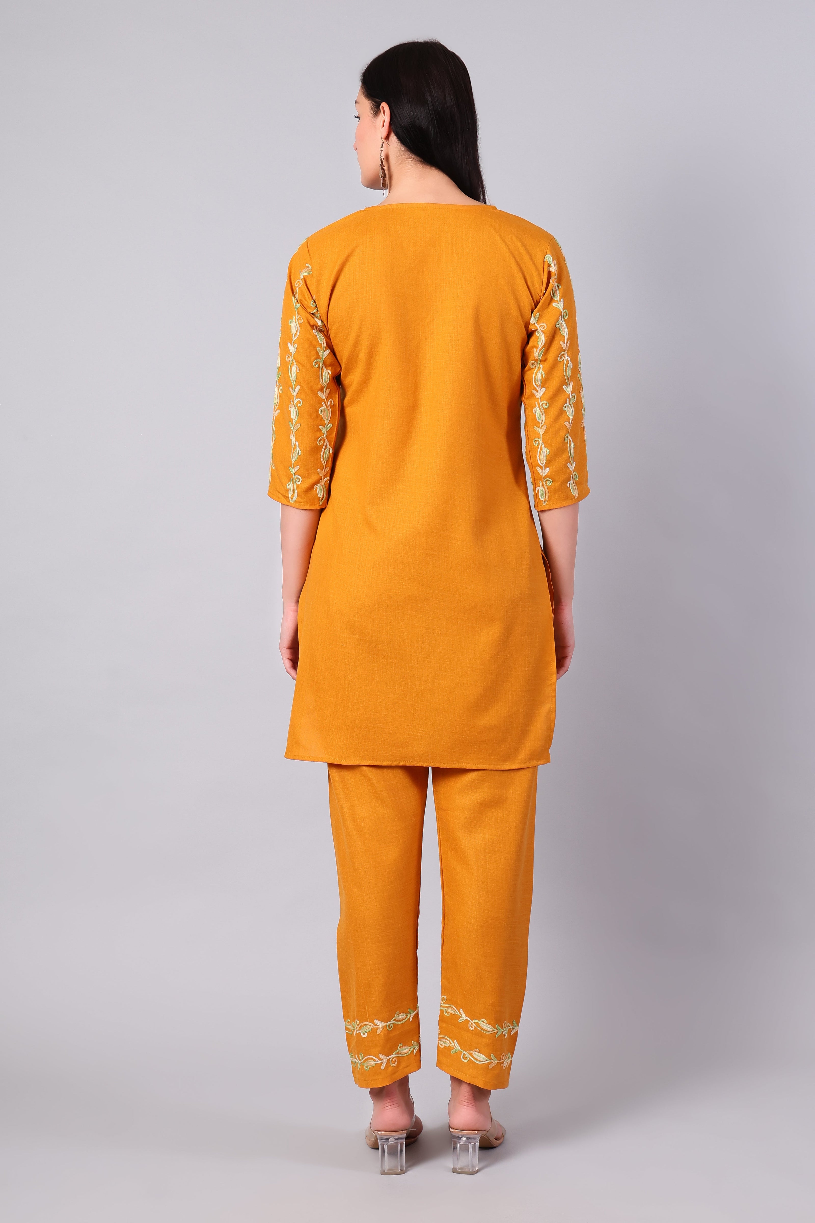 Back view of sunlit amber Kashmiri Aari co-ord set for women