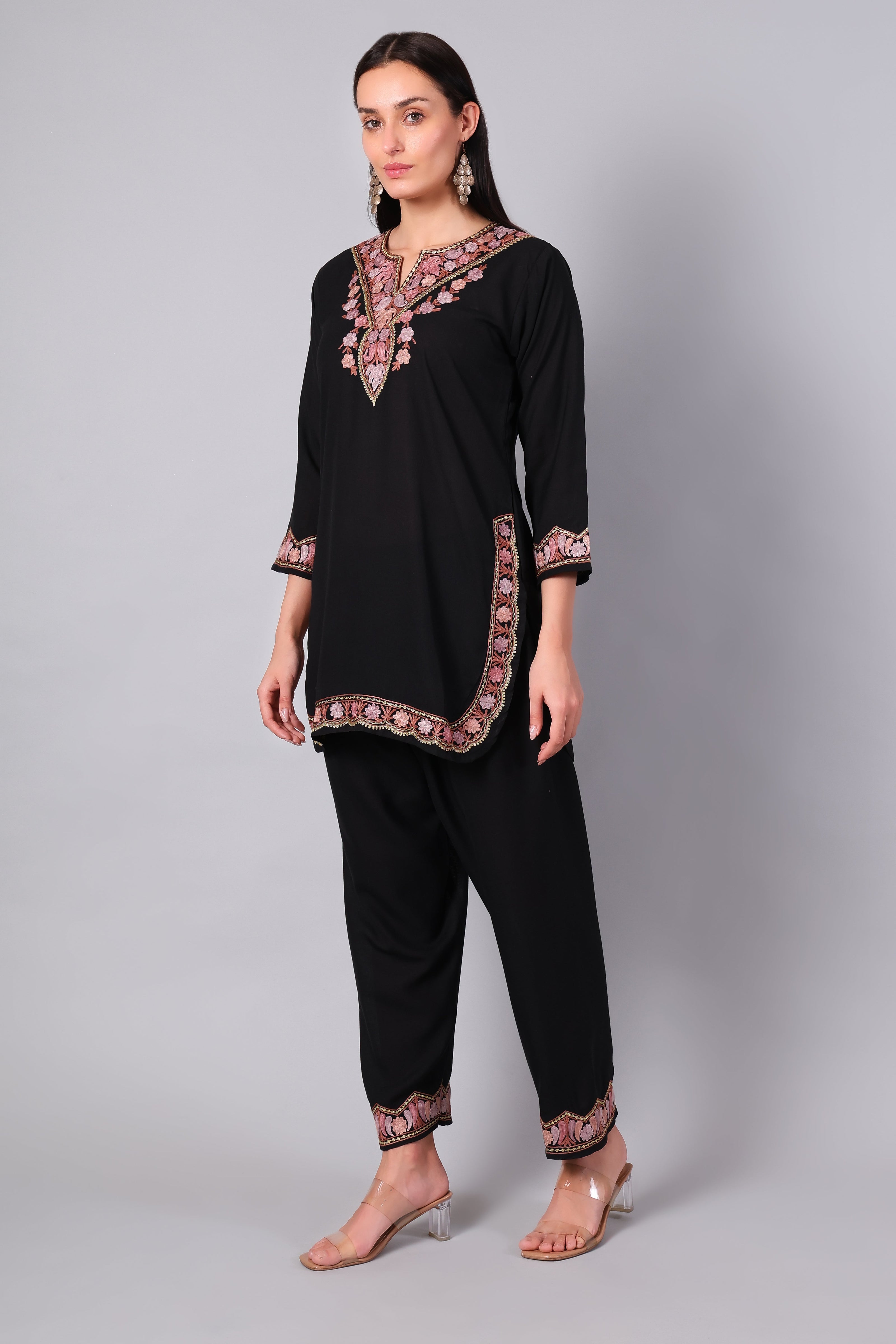 Full outfit of black co-ord set with detailed hemline and pant embroidery