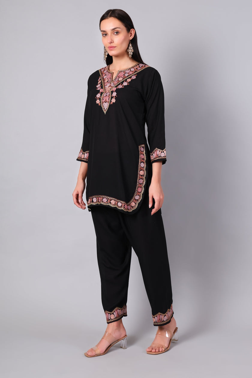 Full outfit of black co-ord set with detailed hemline and pant embroidery