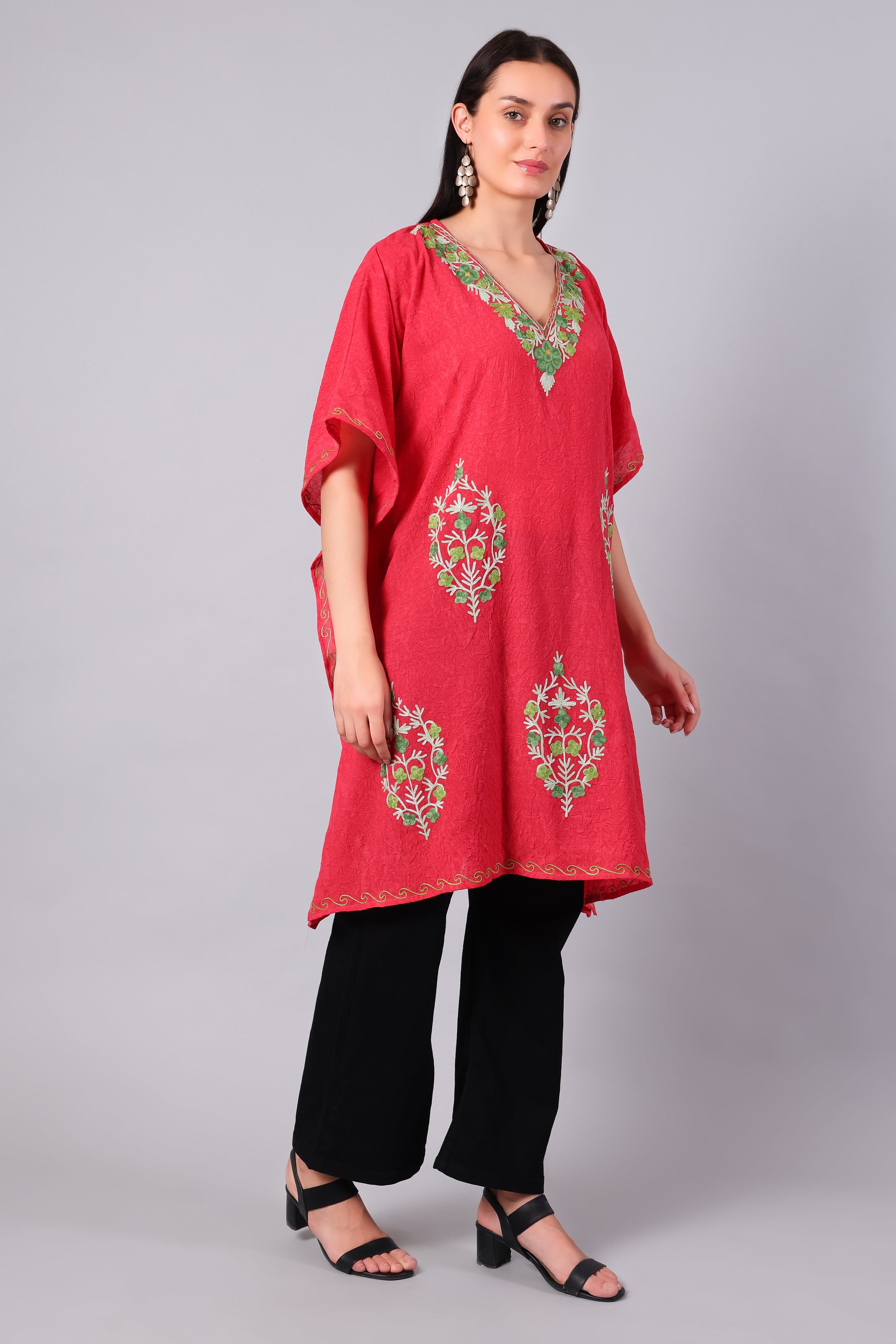 Coral red kaftan for women side view with loose fit and embroidery
