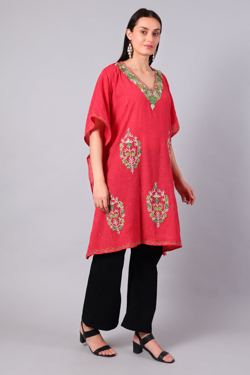Coral red kaftan for women side view with loose fit and embroidery
