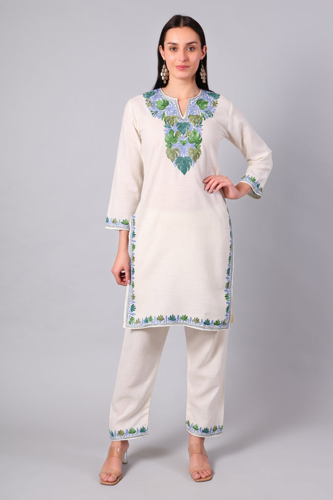 Front view of ivory Kashmiri Aari co-ord set with green and blue embroidery for women