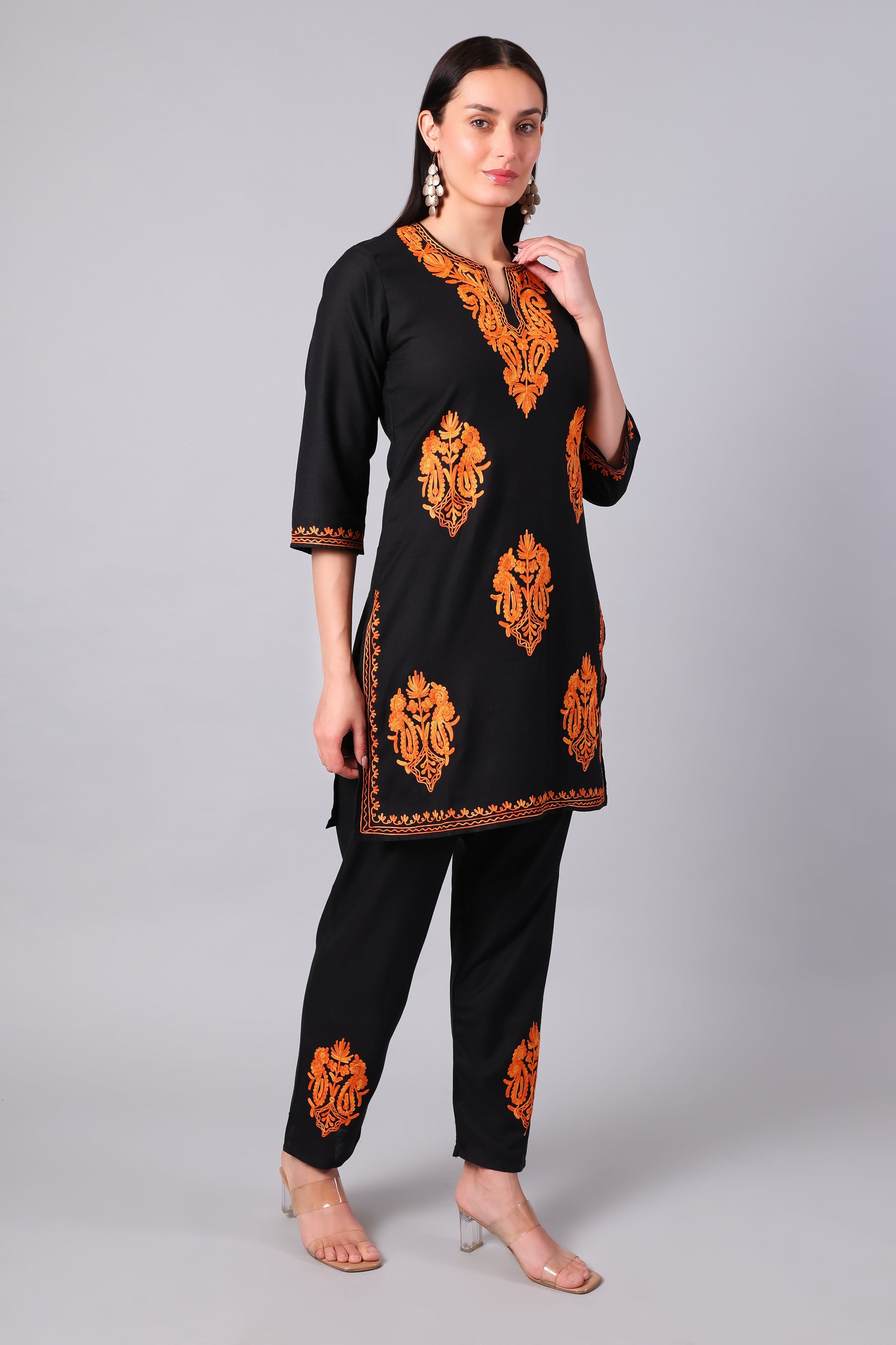 Front view of jet black Kashmiri Aari co-ord set with burnt orange embroidery for women