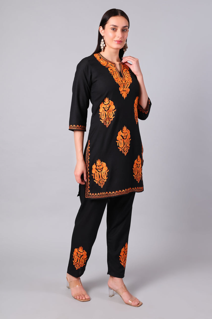 Front view of jet black Kashmiri Aari co-ord set with burnt orange embroidery for women