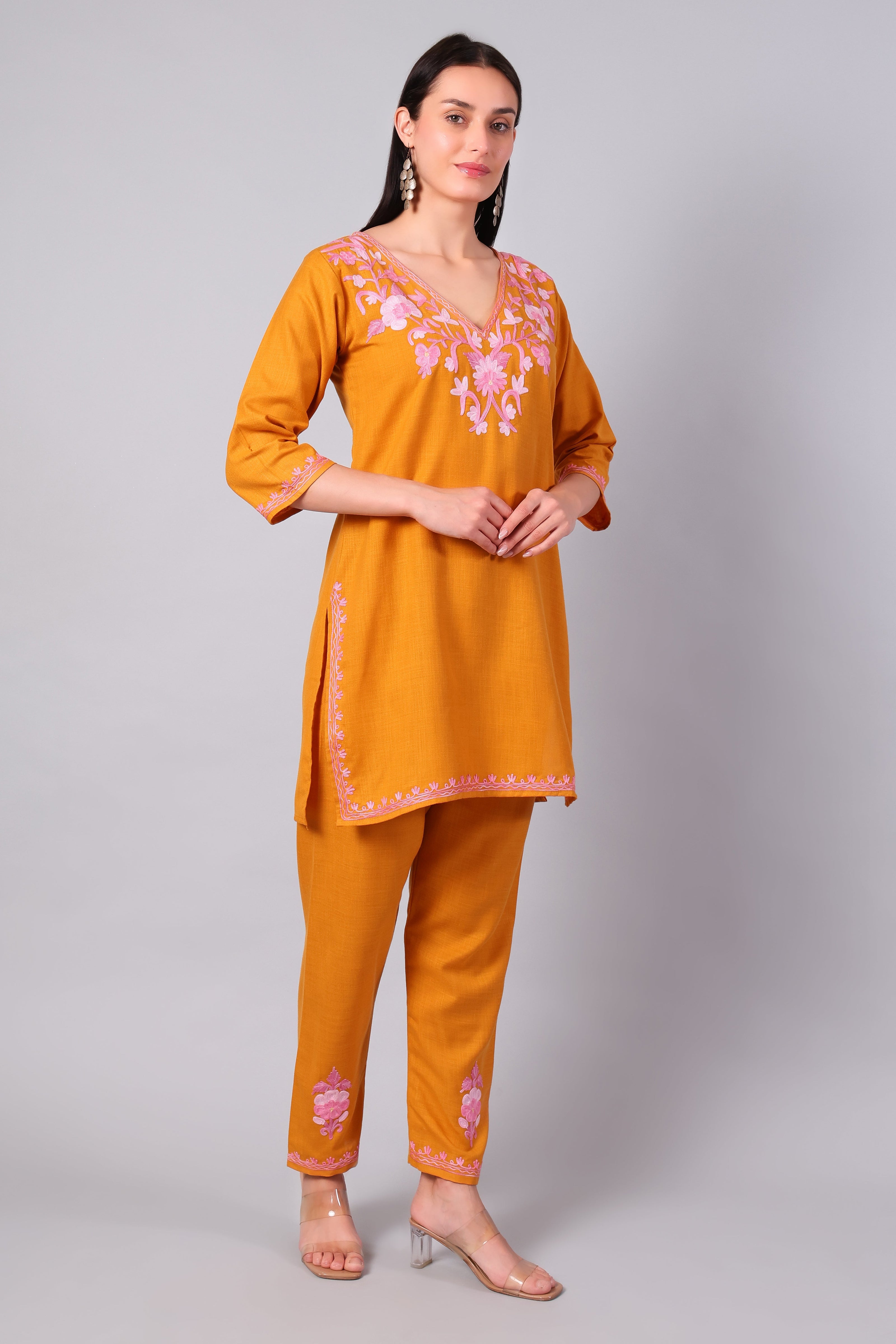 Side view of saffron co-ord set with straight-cut tunic and side slits