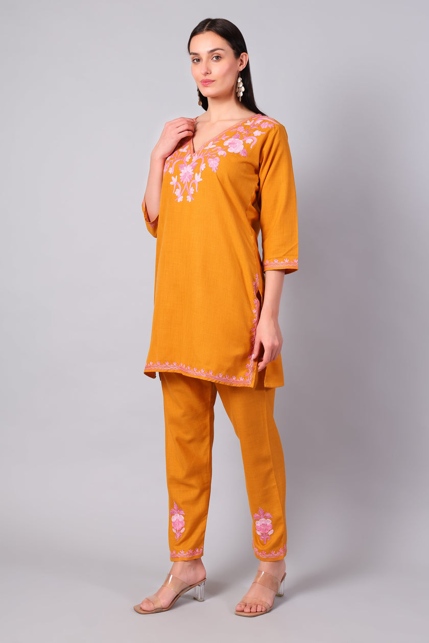 Full outfit of saffron Aari embroidered co-ord set with straight pants for women