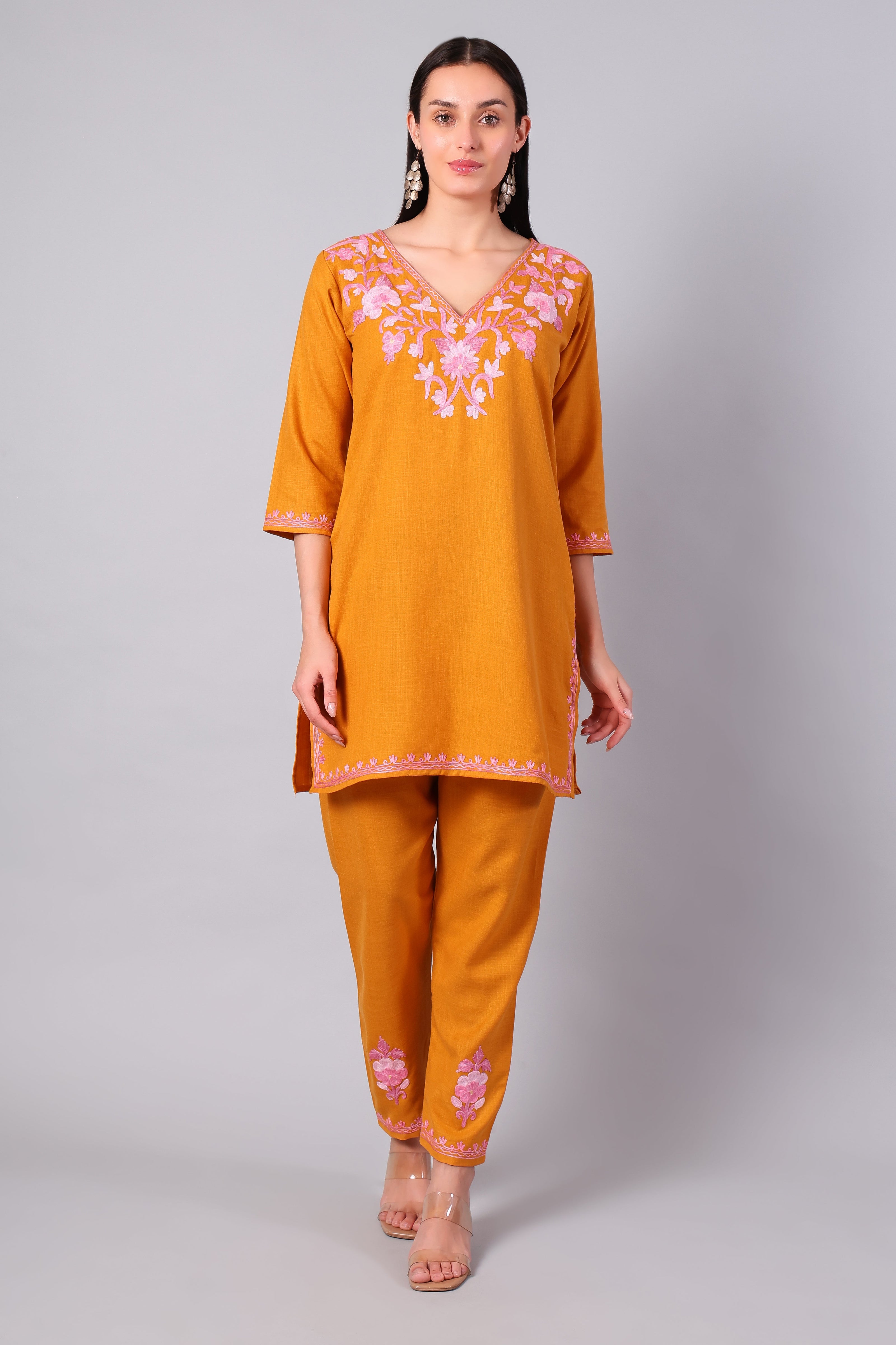 Front view of saffron Kashmiri Aari co-ord set with blush pink embroidery for women