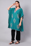 Novbahar teal green Kashmiri kaftan — front angle with floral embroidery detail