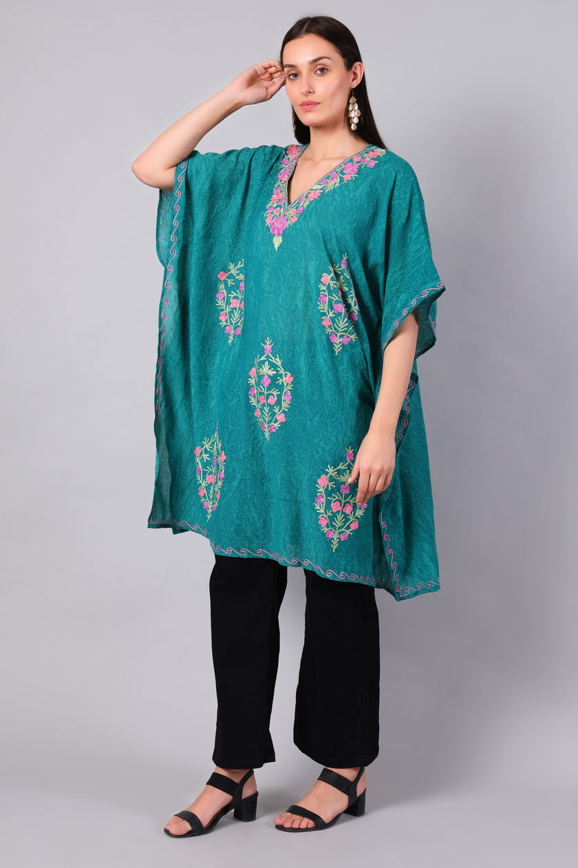Novbahar teal green Kashmiri kaftan — front angle with floral embroidery detail