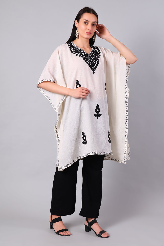 Novbahar ivory white Kashmiri kaftan — front angle with black embroidery detail