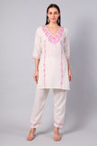Front view of white Kashmiri Aari co-ord set with pink embroidery for women