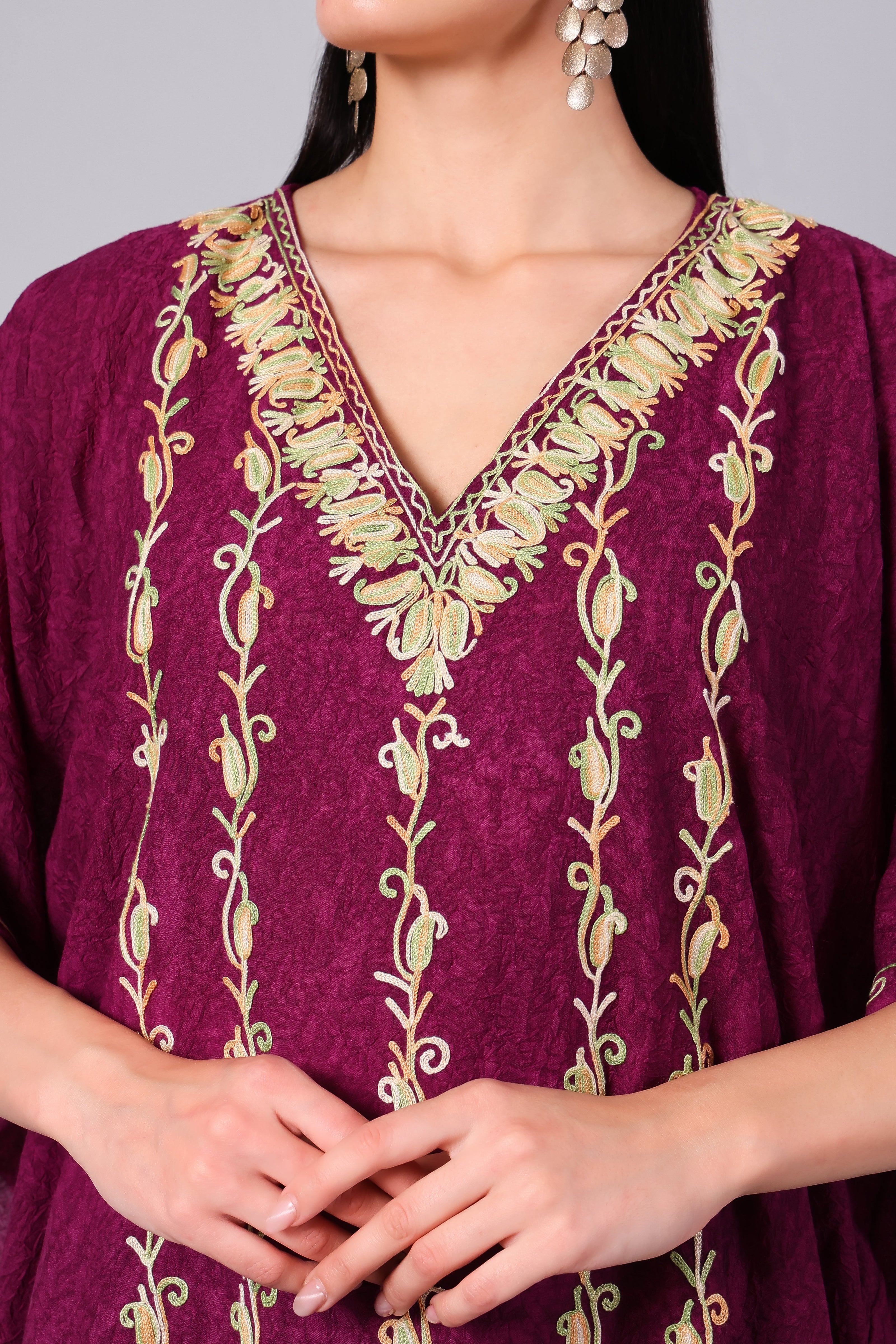 Close-up of Kashmiri Aari embroidery on wine purple kaftan neckline — KashmirPheran